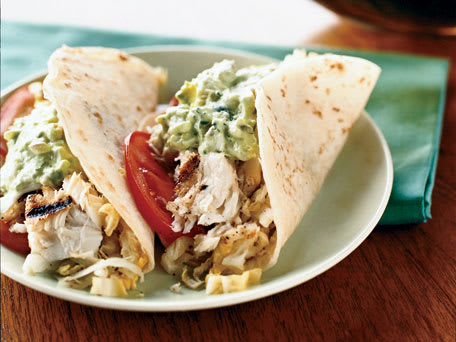 Fish Tacos with Creamy Lime Guacamole and Cabbage Slaw