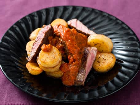 Image of Sliced Flank Steak With Sun-dried Tomato Sauce, Kitchen Daily
