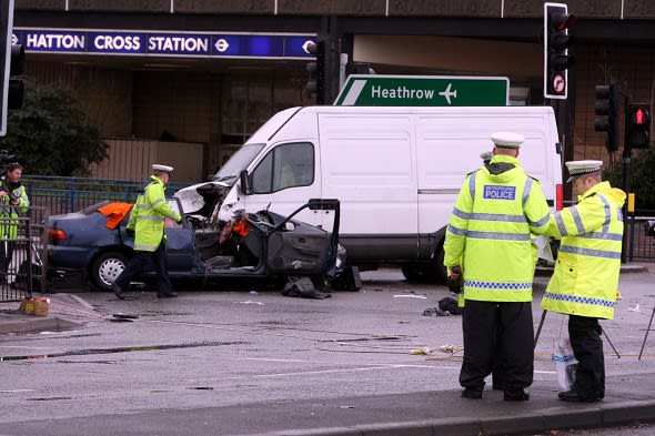 Search: Car crash van deaths police road. Police attend the scene on the A30 