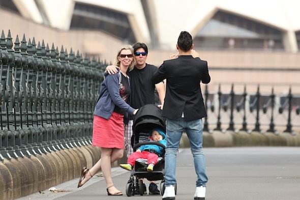 Oblivious tourists ask Lewis Hamilton to take their picture