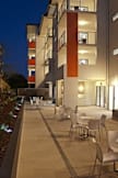 Essence Serviced Apartments - Brisbane, Australia - Evening View Of Bbq Area And Building