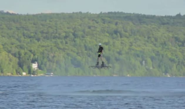 Guy hoverboards across a Canadian lake and into history