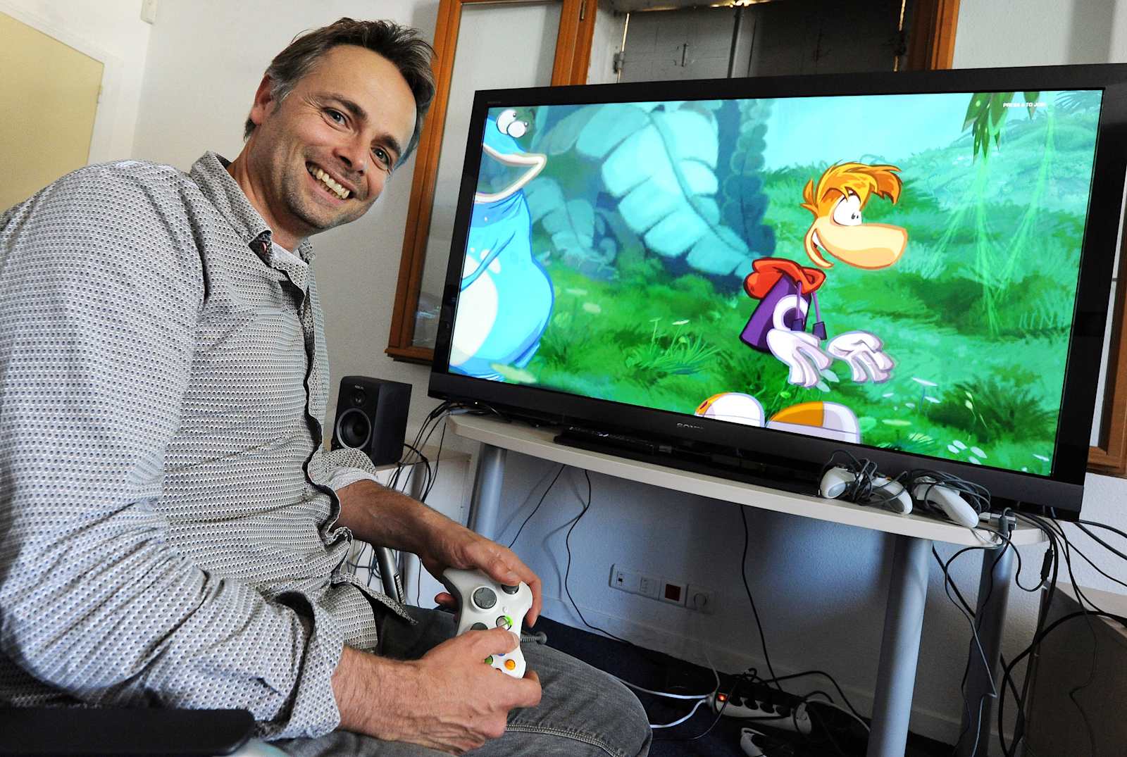 french-videogame-designer-for-ubisoft-company-michel-ancel-poses-with-picture-id116550539