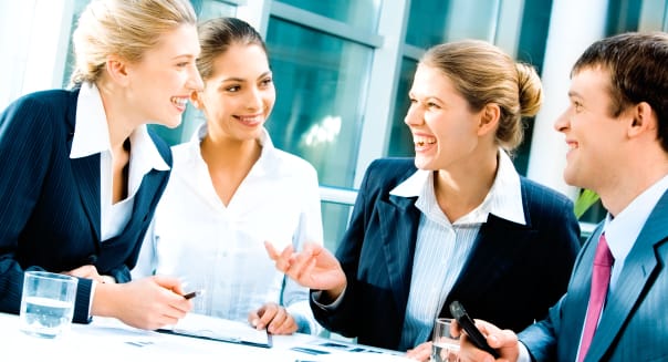 Image of laughing confident people planning a business-strategy