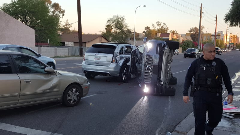 photo of Uber pauses its self-driving efforts following Arizona crash image