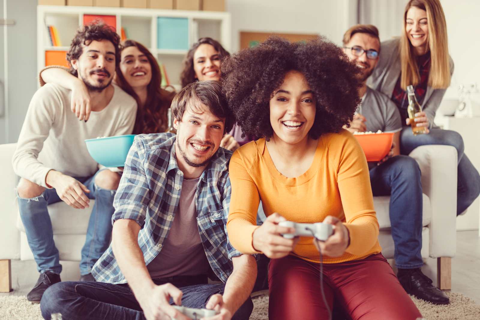 colleagues-playing-video-games-in-the-office-relax-room-picture-id517125564