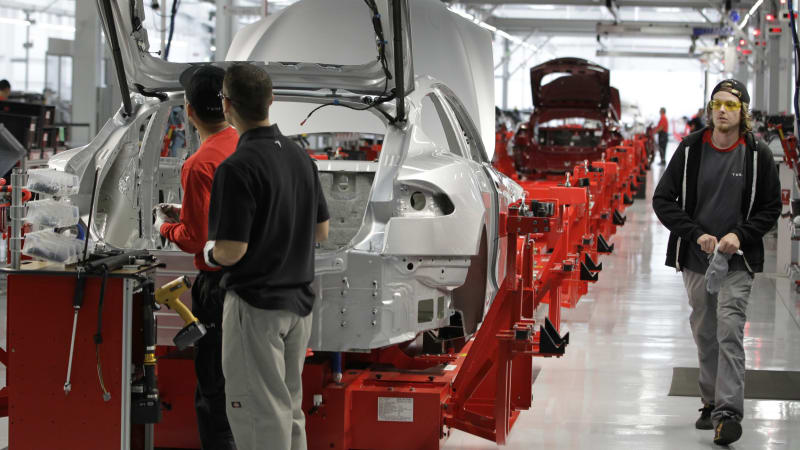 photo of Tesla almost doubled its staff in 2014 image