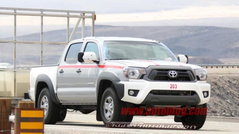 Next-gen Toyota Tacoma mule caught towing in the desert