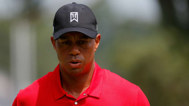 Woods return in doubt