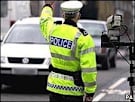 Police officer stopping car