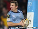 Blues wing Richard Mustoe waltzes over unopposed against the Dragons