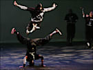 Brandon Peace Albright (in the air) and J Spin of Illstyle & Peace performed at Dance Place.