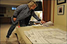 Amy Shiman pores over documents she has amassed as the leader of a group opposed to a Suburban Hospital expansion plan.