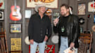 Alan Jackson (left) sizes up the store full of his paraphernalia.