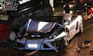 An Italian police Lamborghini Gallardo that crashed into parked cars