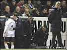 Wenger watches Cesc Fabregas limp off against Burnley