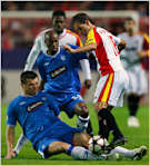DaMarcus Beasley, center, in action for Rangers in a Champions League match this month against Sevilla.