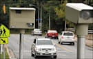 Watchful eyes: Speed cameras monitor traffic on the 2200 block of Wootton Parkway in front of Wootton High School in Rockville.