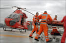 An air ambulance and staff
