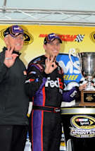 Owner Joe Gibbs and Denny Hamlin picked up a few trinkets in 2009. (US Presswire)