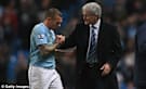 Call on me: Sacked Manchester City boss Hughes spoke to Bellamy on the phone, pleading with him to win the Premier League title