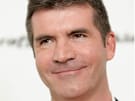 Simon Cowell poses on the press line at the Elton John Academy Award viewing and after party in West Hollywood, Calif., Sunday, Feb. 22, 2009.