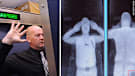 A staff member demonstrates a full body scan at Manchester Airport in the UK.
