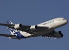 An Airbus 380 jet flies during the Dubai air show November 15,2009. REUTERS/Ahmed Jadallah