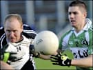 Loup's Dominic McVey and Kilcoo's Anthony Devlin