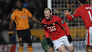 Wayne Rooney wheels away in celebration after scoring Manchester United's first goal against Hull.