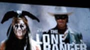  Johnny Depp has hung up his pirate's hat and traded it in for face paint and a bird. He's playing Tonto in Disney's new take on 