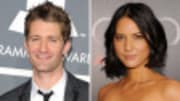 Perfect Couples star Olivia Munn holds onto Glee actor Matthew Morrison's hand while they watch the New York Rangers take on the Philadelphia Flyers at Madison Square Ga...