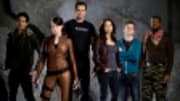 I'm standing in a drab, monochromatic police department TV set in Vancouver that could quite feasibly serve as the base for any number of procedural police dramas on the...