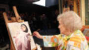  Betty White is restoring a painting on 