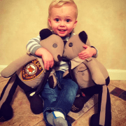 Son of slain police officer given teddy bears made from dad's uniform
