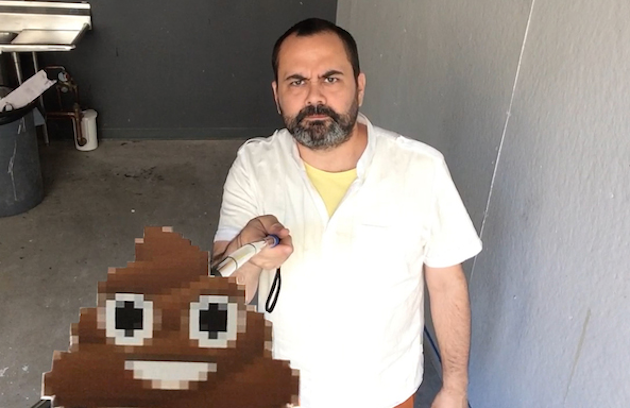 photo of Artist adds poop emoji to selfie sticks to remind us of mortality image