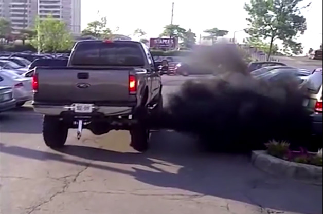 Ford F-150 driver 'rolling coal' in a parking lot