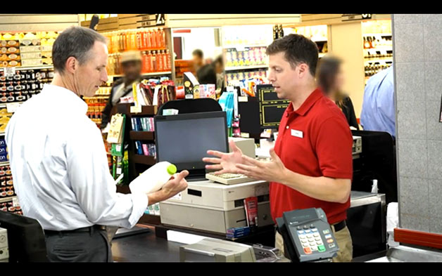 Screencap of Edmunds ad depicting haggling over groceries