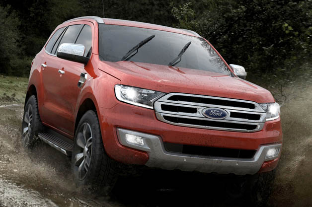 Ford Everest SUV splashing through the mud
