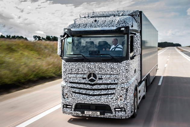 Mercedes' semi-autonomous truck lets its driver relax on the highway