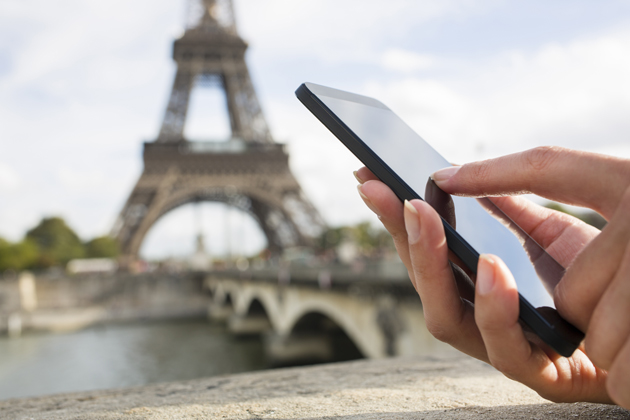 A smartphone user in Paris