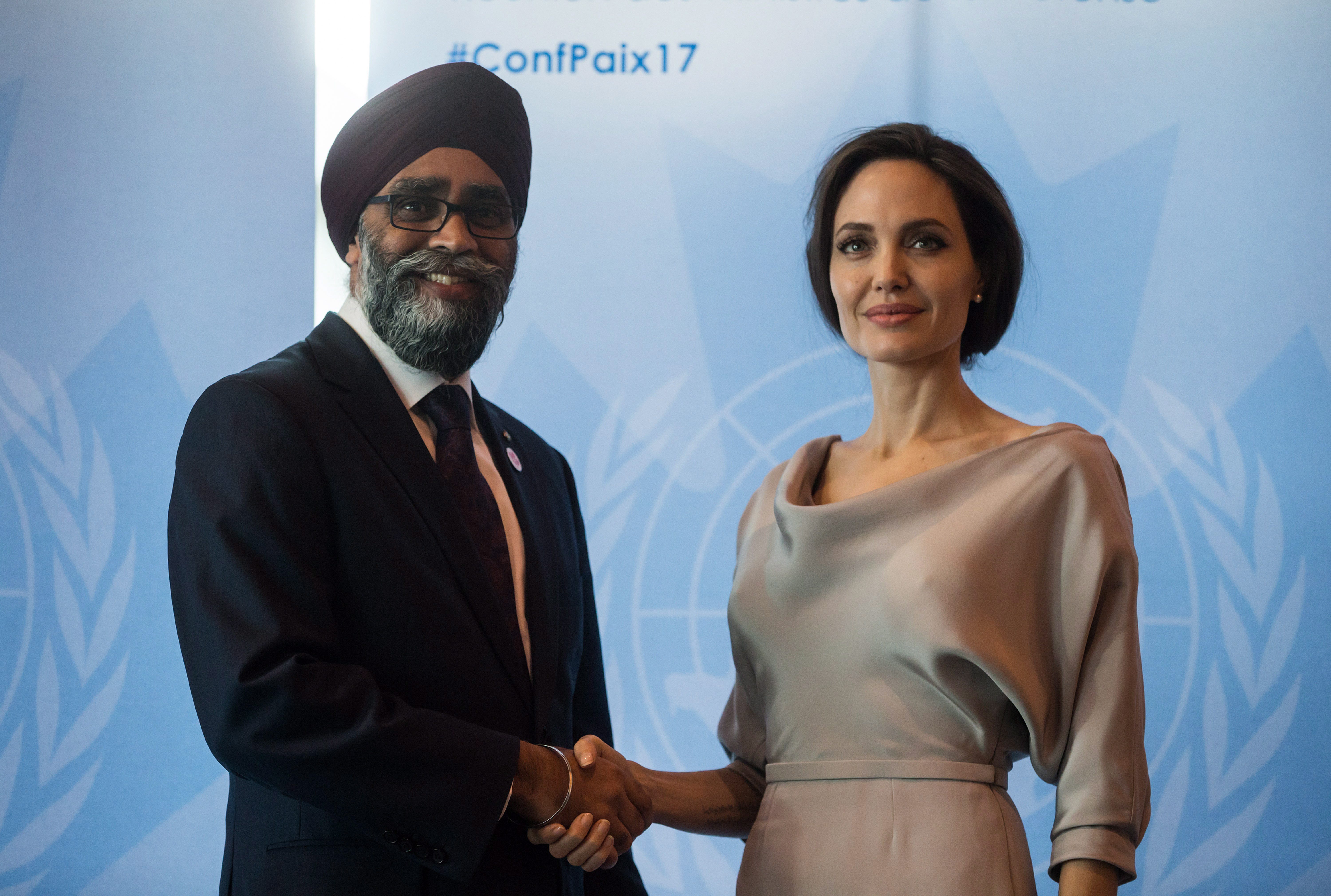 Defence Minister
]]>
<![CDATA[
Harjit Sajjan, left, and UNHCR Special Envoy Angelina Jolie pose for photos before her keynote address at the 2017 United Nations Peacekeeping Defence Ministerial conference in Vancouver on Wednesday. 