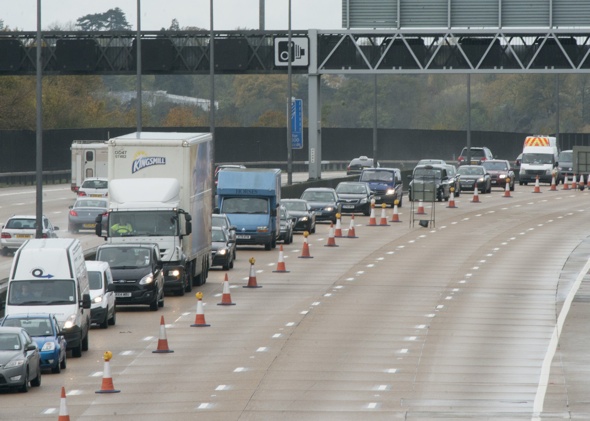 The M25 'collapses' in the rain causing traffic chaos