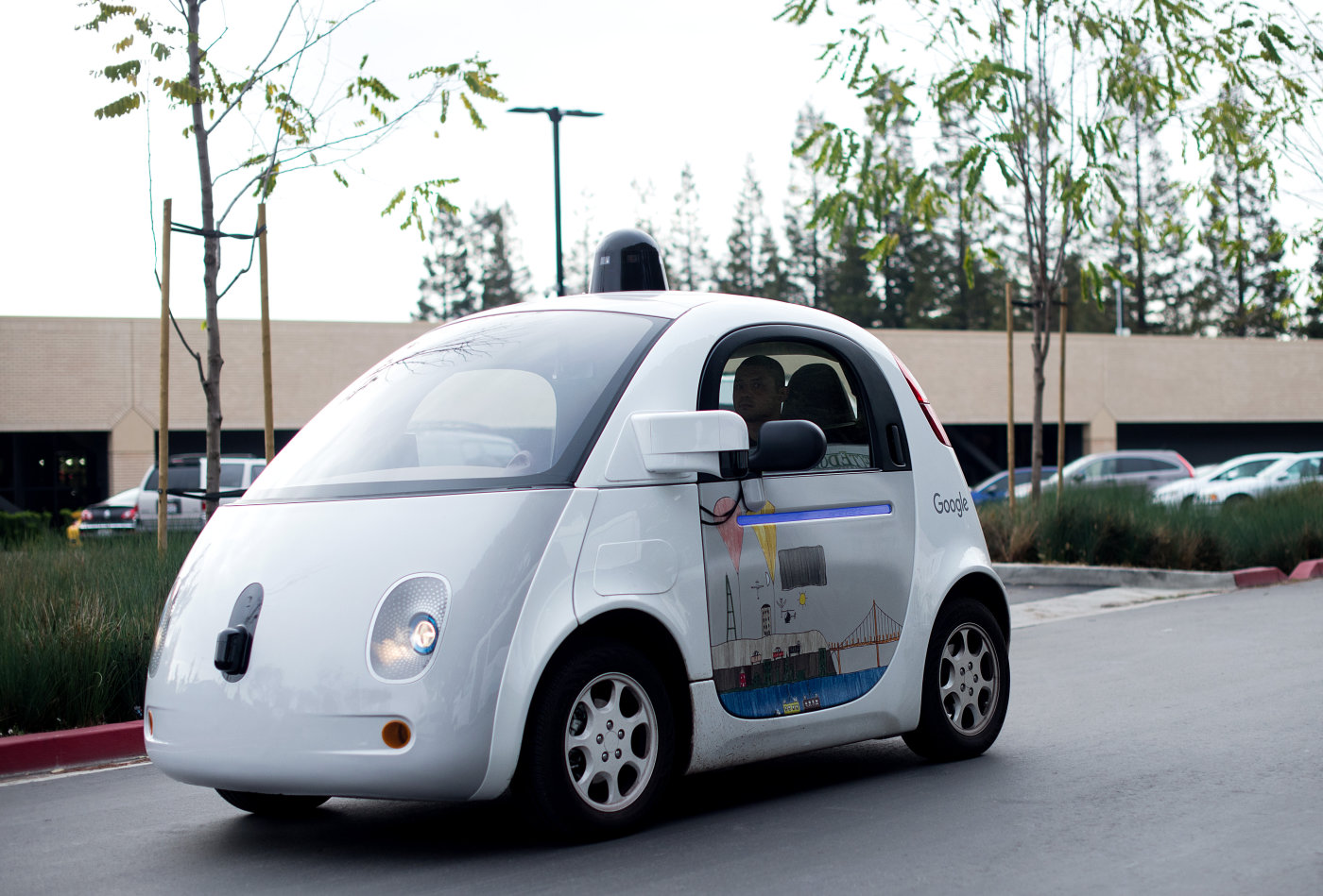 photo of Google is exploring wireless charging for self-driving cars image