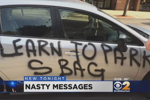 Vandalized parked car in Queens