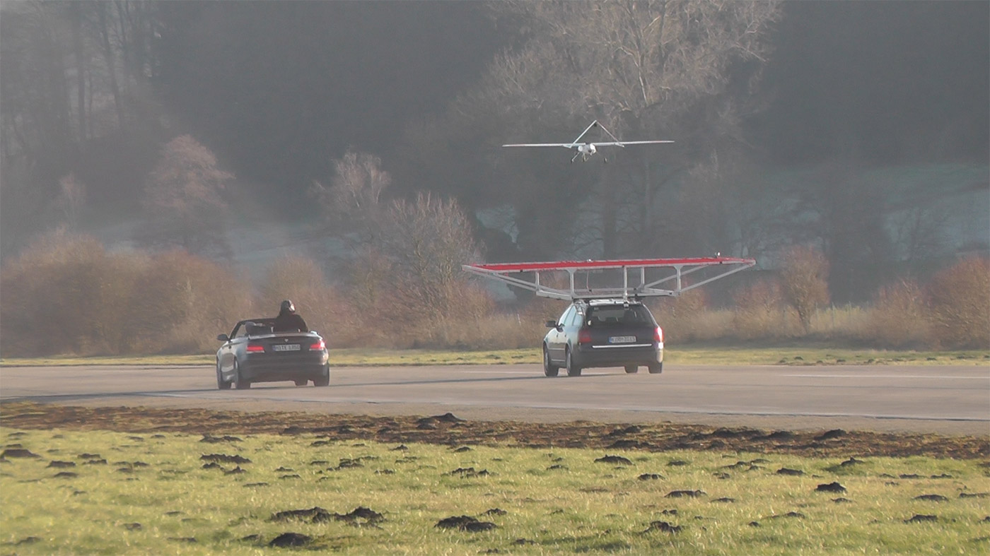 Watch a drone autonomously land on a moving car