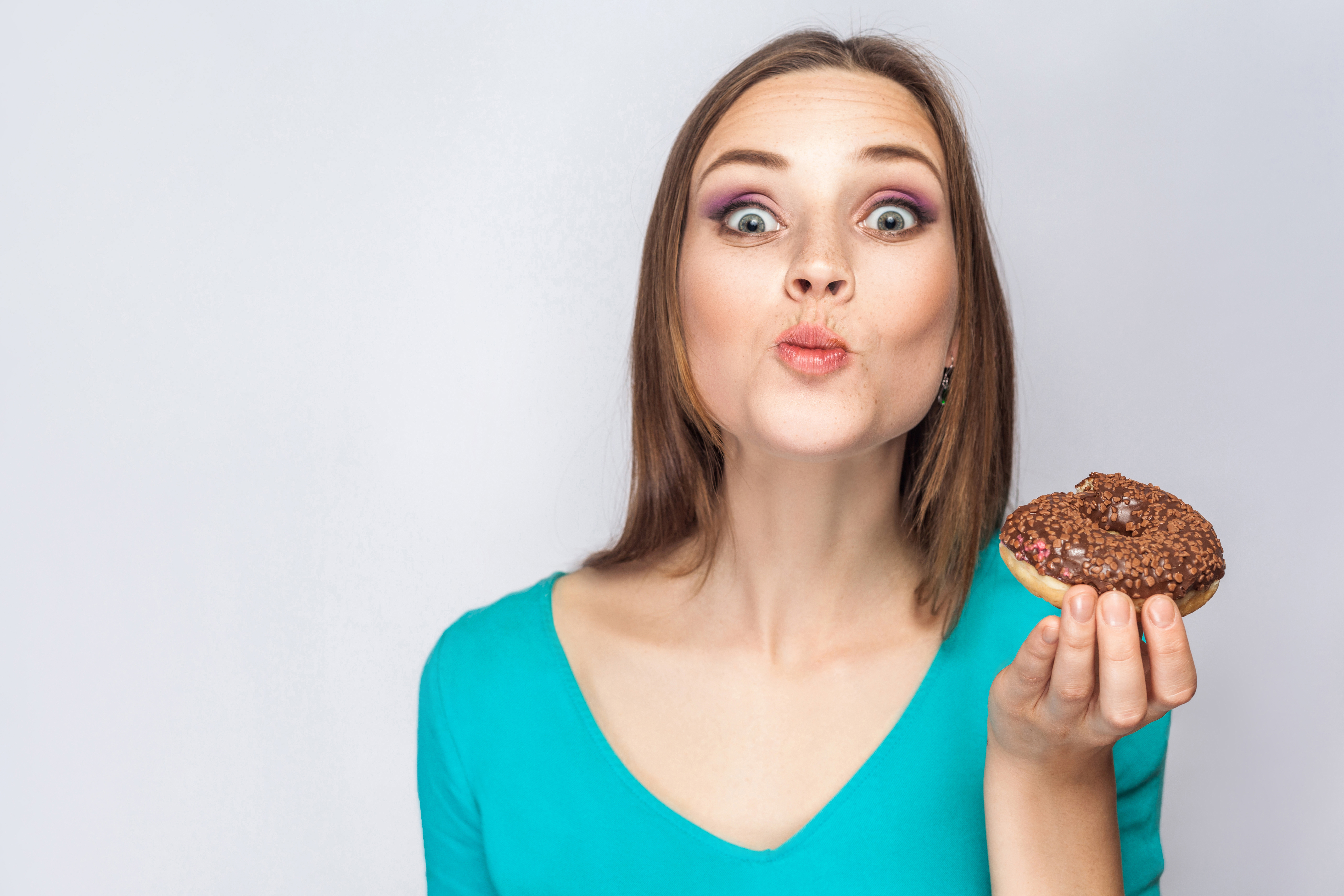 Girl eating donuts