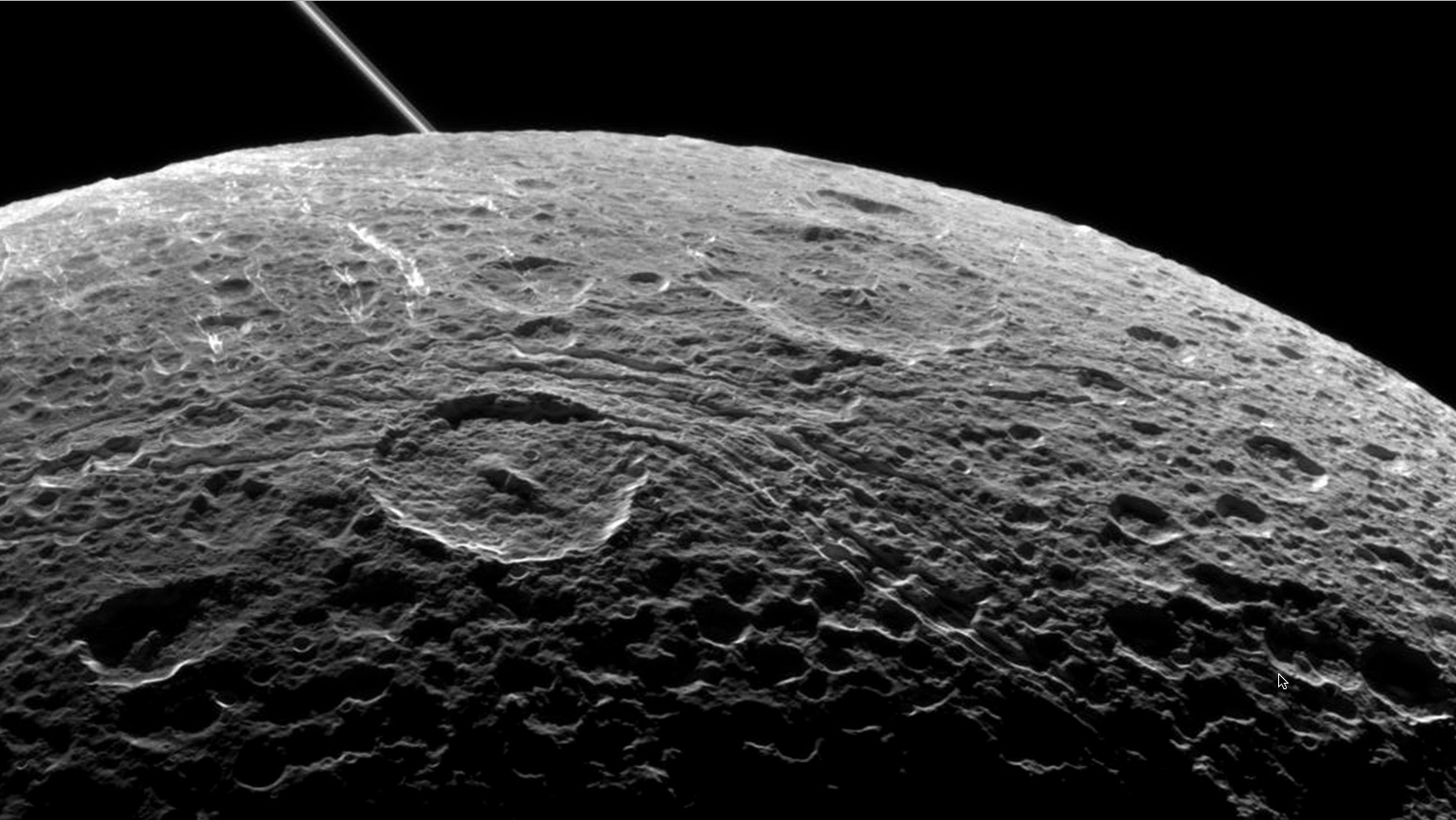 [Image: Dione+by+Cassini.jpg]