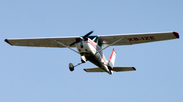 Cessna 150 in mid-flight