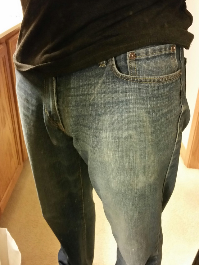 photo of This man's jeans show the scars of multiple phone upgrades image